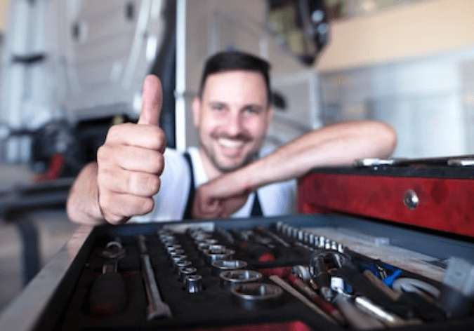 cbd-hemp-oil-hand-holding-bottle-of-cannabis oil